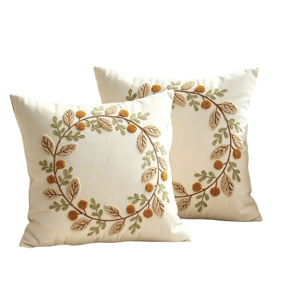 Cream-colored throw pillow cover with intricate embroidered autumn wreaths featuring beige leaves and orange berries