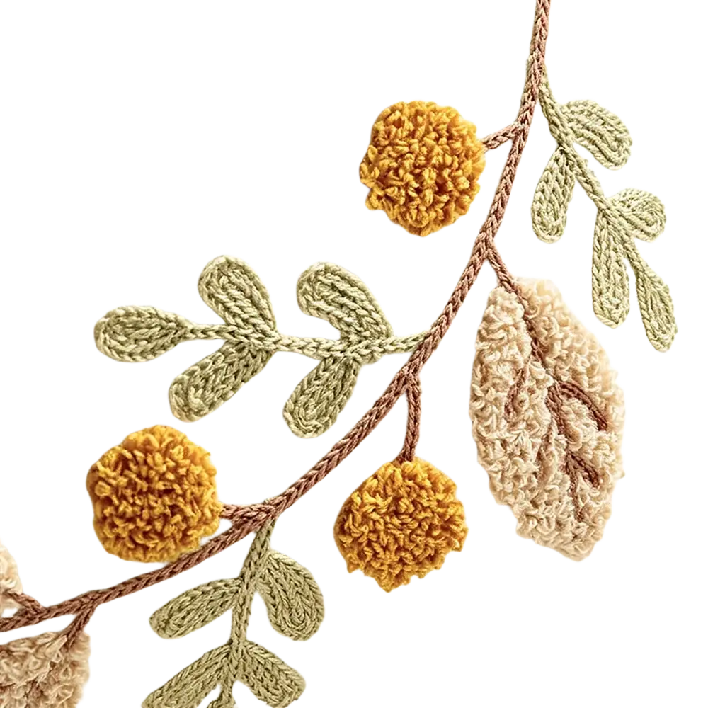 Cream-colored throw pillow cover with intricate embroidered golden pom-pom flowers and soft green leaves 45x45cm