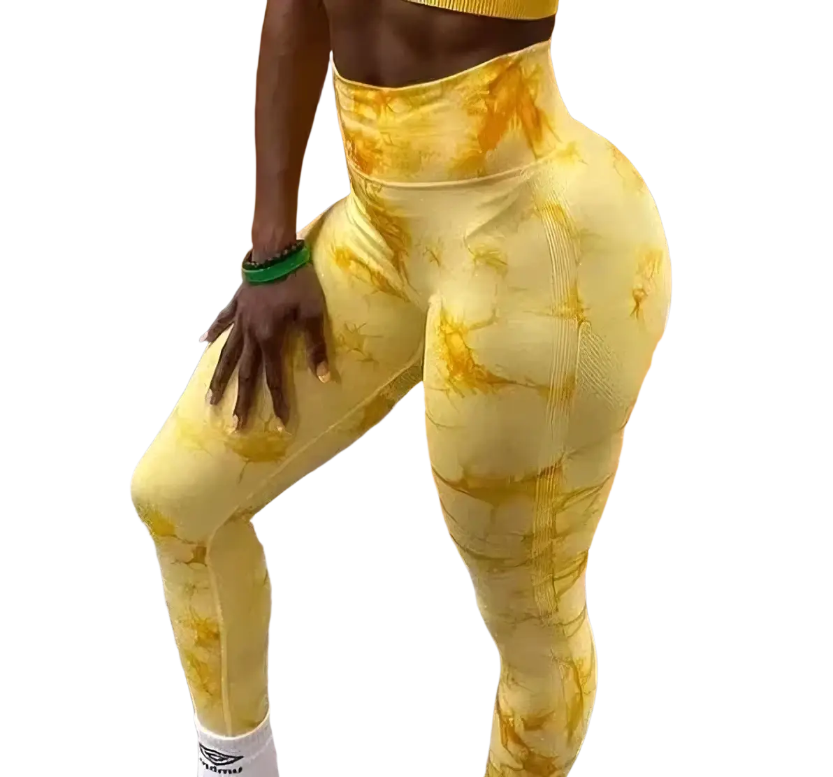 High-waisted yellow and orange tie dye seamless scrunch gym leggings with a snug form-fitting design