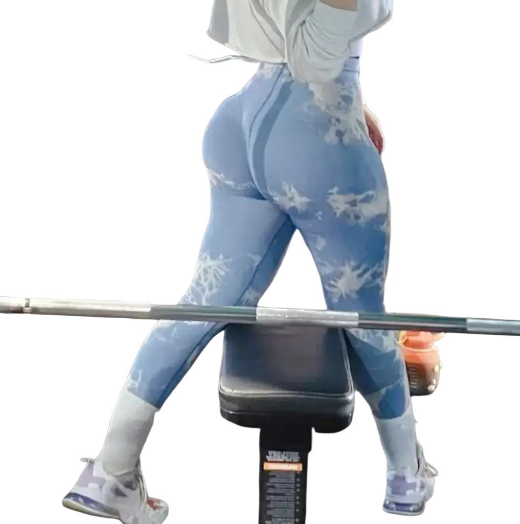 Light blue tie dye seamless scrunch gym leggings with white splatter patterns made of stretchy fabric