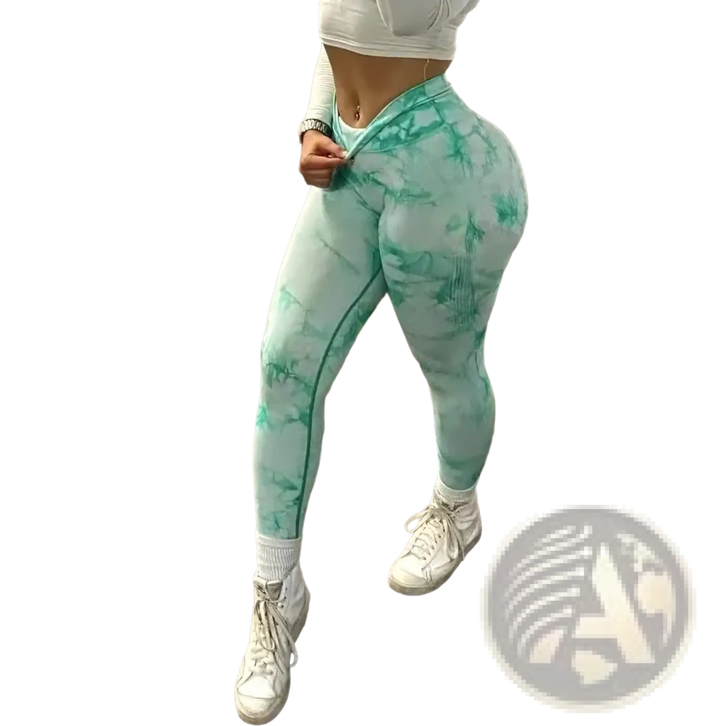 Mint green tie dye seamless scrunch gym leggings with high waist and snug form fitting design for activewear