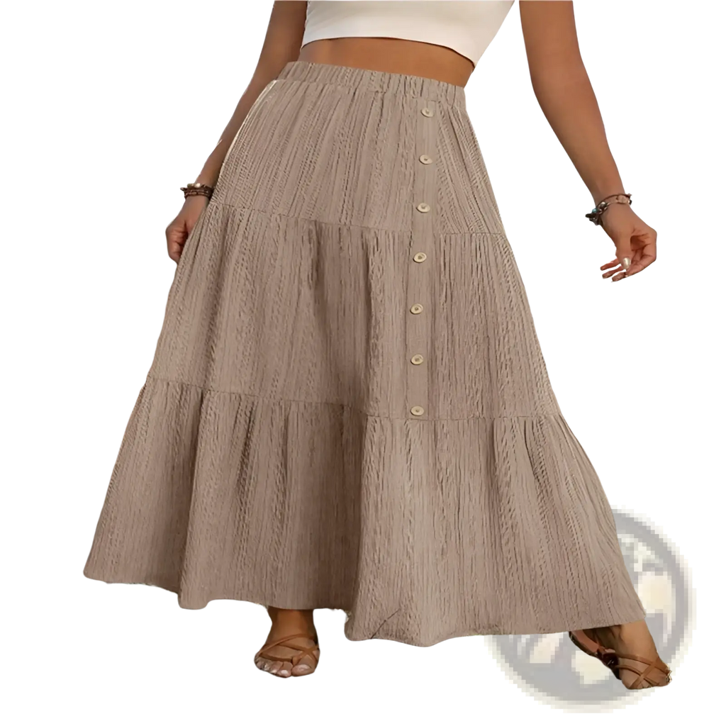 Beige tiered maxi skirt with button front closure made of lightweight textured fabric for casual wear