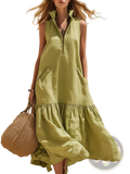 A flowing olive-green tiered sleeveless maxi dress with high collar and front zipper neckline