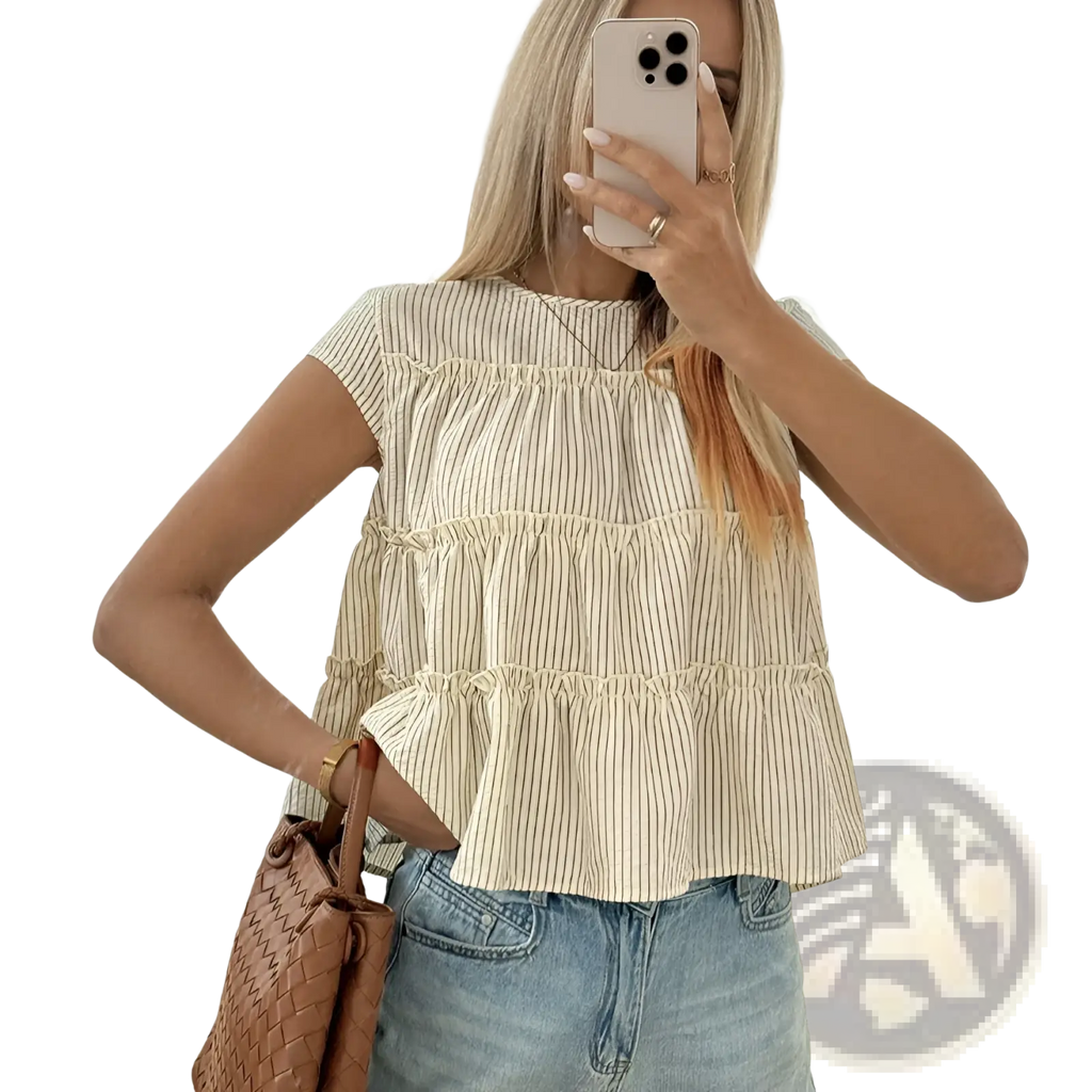 Beige and black vertically striped sleeveless tiered blouse with ruffled hem suitable for casual wear