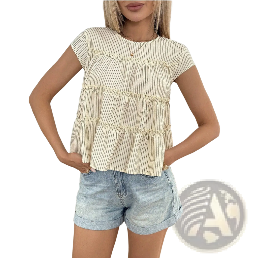 Cream-colored tiered striped ruffle hem blouse with thin black vertical stripes in lightweight fabric