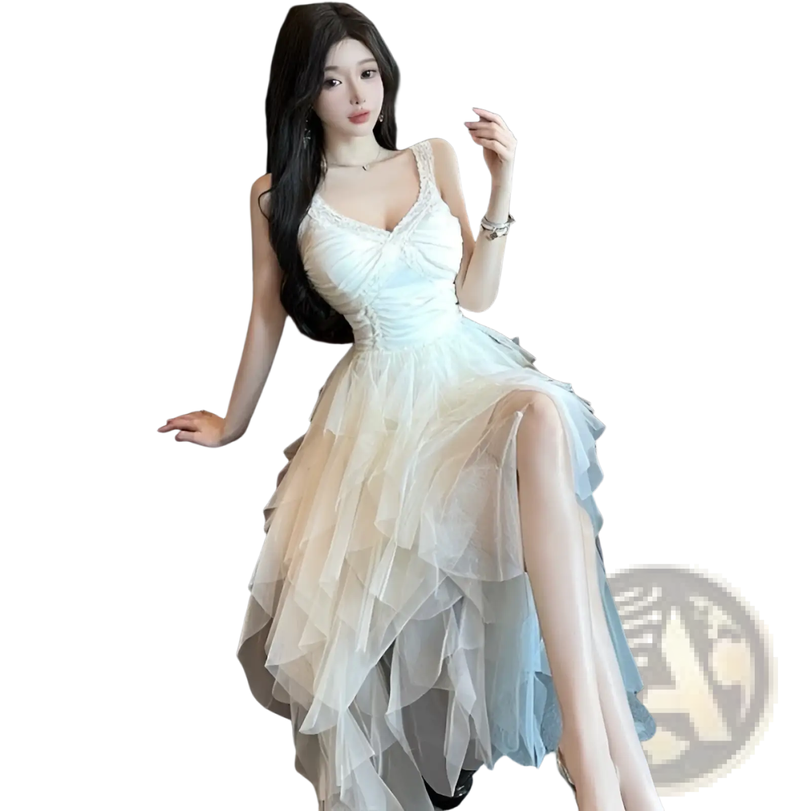 A flowing off-white tiered tulle and lace mesh evening gown with a fitted bodice and delicate lace trim