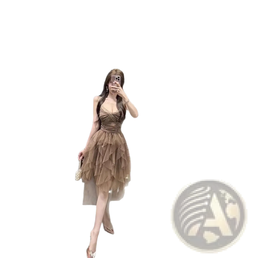 A shimmering taupe tiered tulle and lace mesh evening gown with a fitted bodice and flowing ruffled skirt