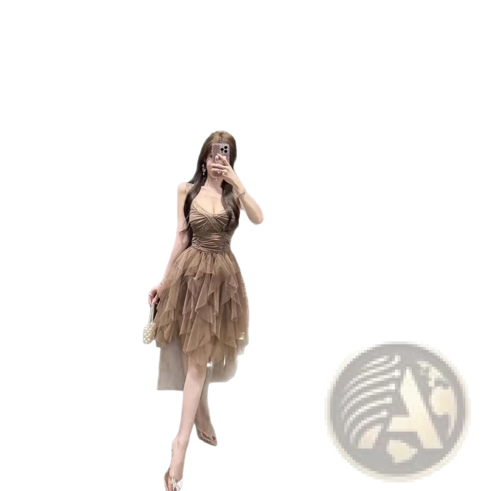 A shimmering taupe tiered tulle and lace mesh evening gown with a fitted bodice and flowing ruffled skirt