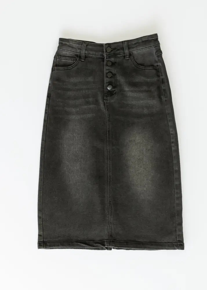 Black denim midi skirt with high waist and button front closure featuring subtle fading details