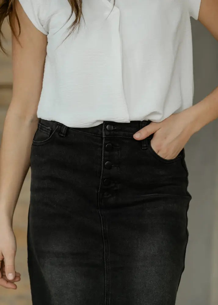 Black denim midi skirt with high waist and button-front design suitable for stylish casual wear