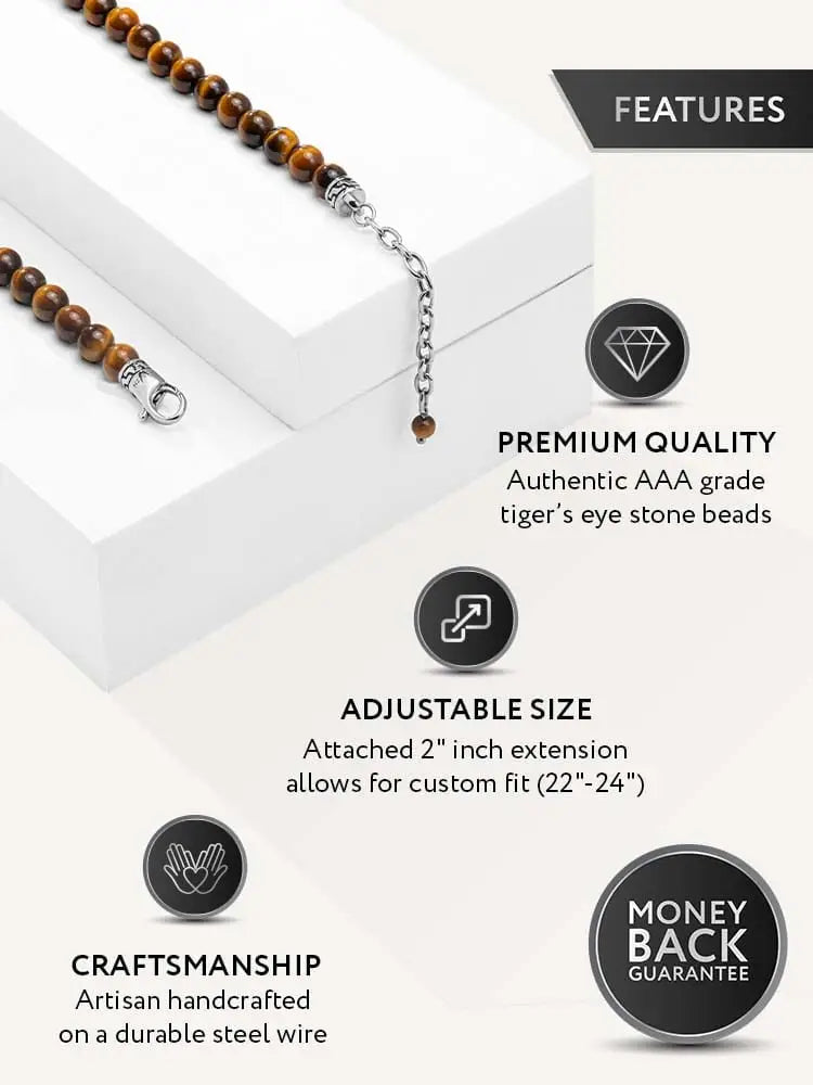 A sleek silver-toned tiger eye beaded stainless steel bracelet with polished aaa grade stones and matching clasp