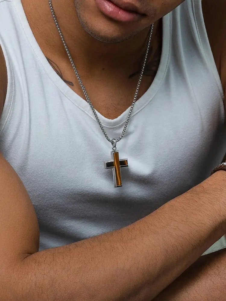 Silver chain necklace with tiger eye stainless steel cross pendant featuring black and amber-colored inlays