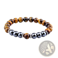 A stylish tiger eye and magnetic obsidian beaded elastic bracelet with black beads and silver-toned spacers