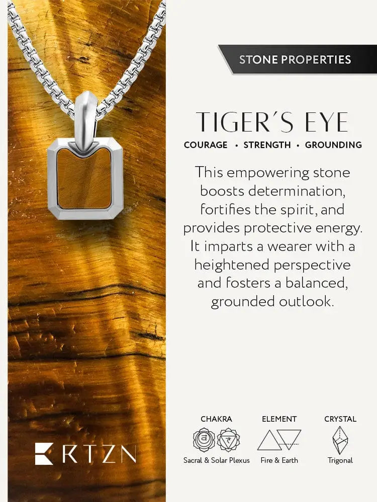 Silver-toned stainless steel dog tag necklace with a golden tiger eye stone in a sleek modern rectangular pendant design