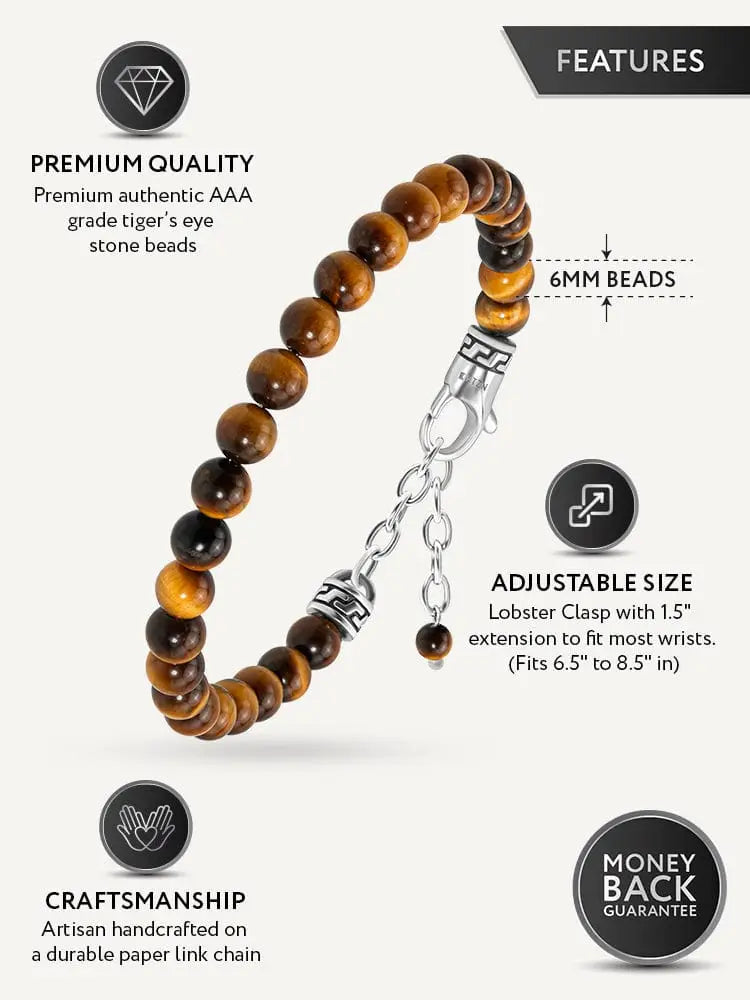 A tiger eye beaded bracelet with round amber and dark brown beads and a silver chain clasp