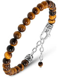 Tiger eye beaded bracelet with silver chain clasp featuring alternating brown and golden hues on polished beads