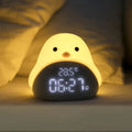 Yellow silicone chick-shaped night light with digital time and temperature display from Time Bird smart clock series