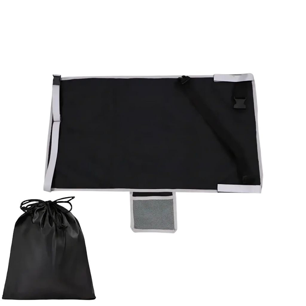Black fabric toddler airplane seat extender travel footrest with gray trim and adjustable straps for car seats