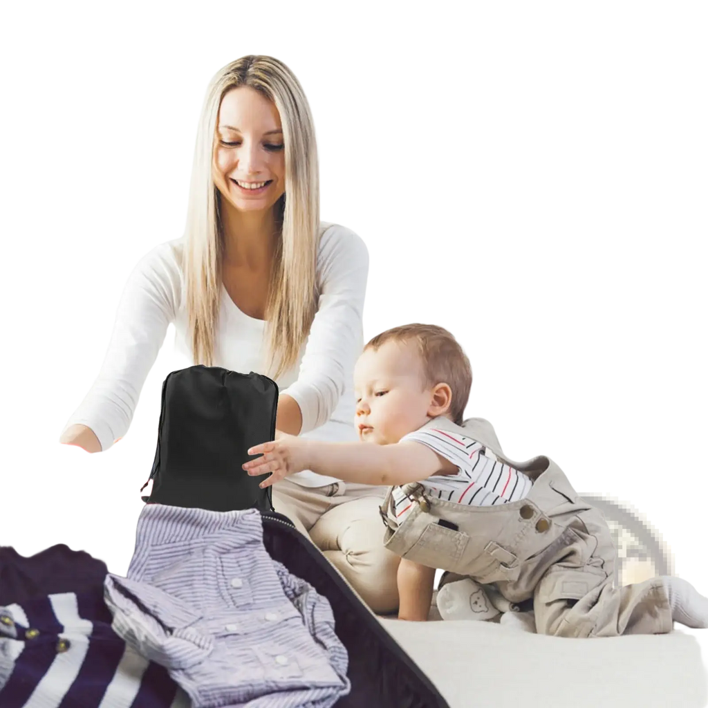Black foldable travel organizer bag made of durable fabric for toddler airplane seat extender travel footrest use