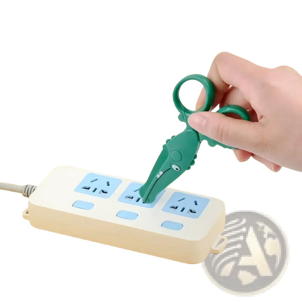 Green plastic crocodile-shaped toddler safety scissors with rounded edges and non-conductive child-safe design
