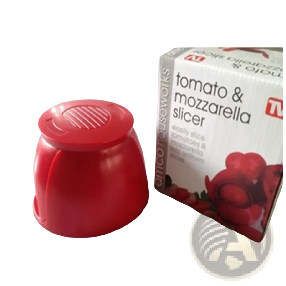 Red plastic tomato slicer and mozzarella cutter kitchen tool with a ridged top lid for easy slicing