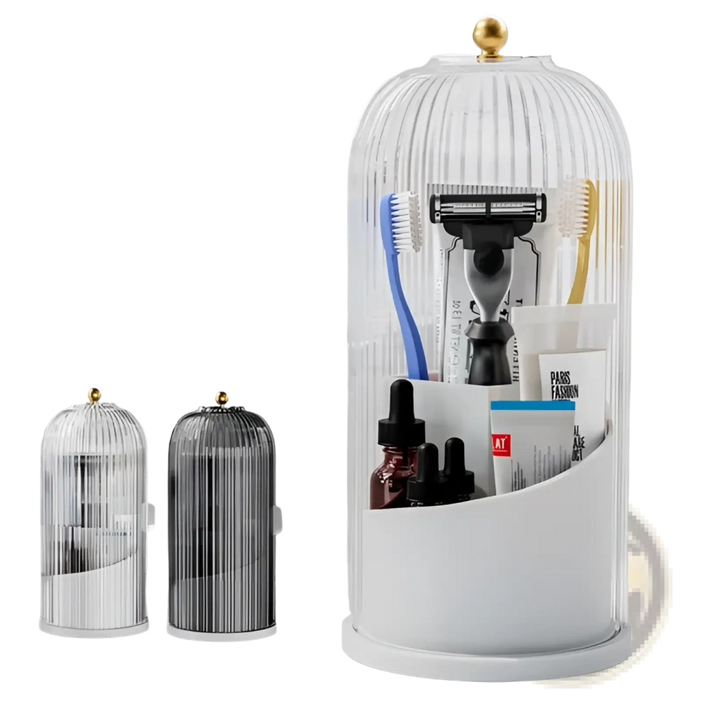 Clear glass birdcage-style toothbrush holder with sliding cover and gold-toned finial holding razors and toothbrushes