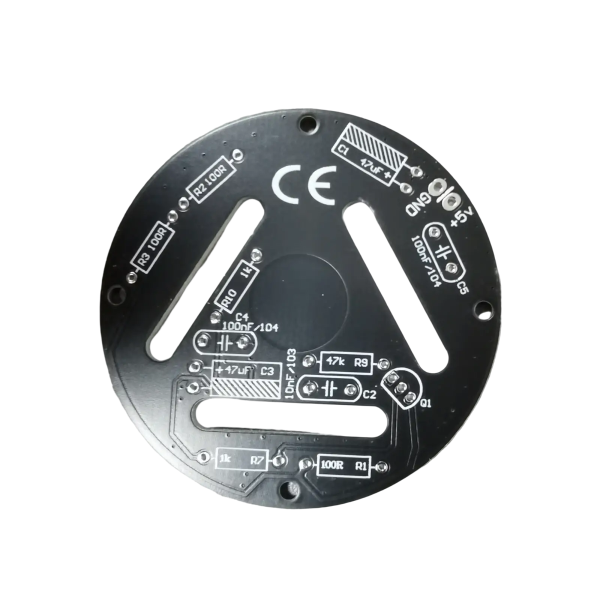 Black circular circuit board with silver soldered components and white labels for touch dimming led soldering diy kit