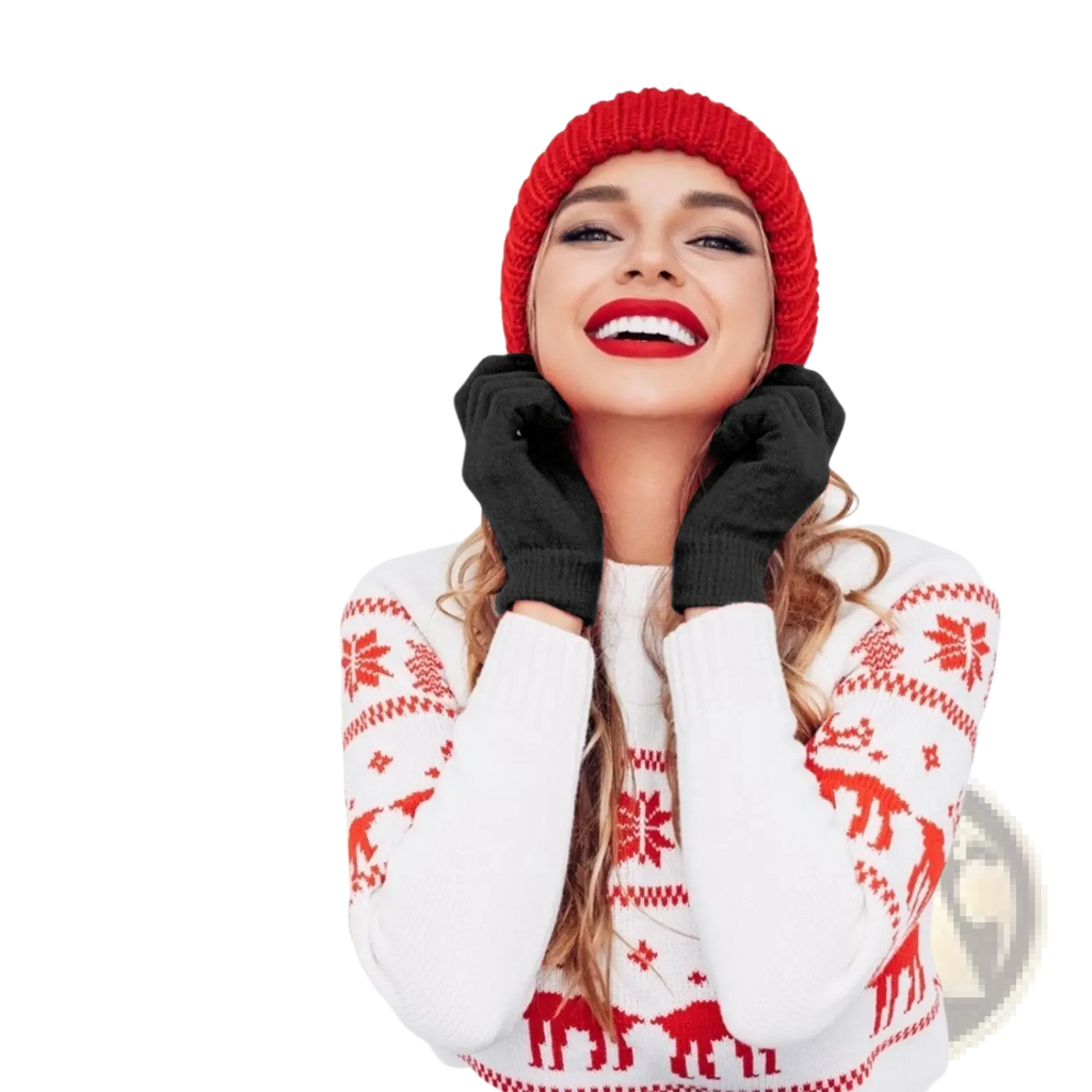 A woman wearing a red and white knitted beanie with a ribbed brim models touch screen winter gloves for men and women