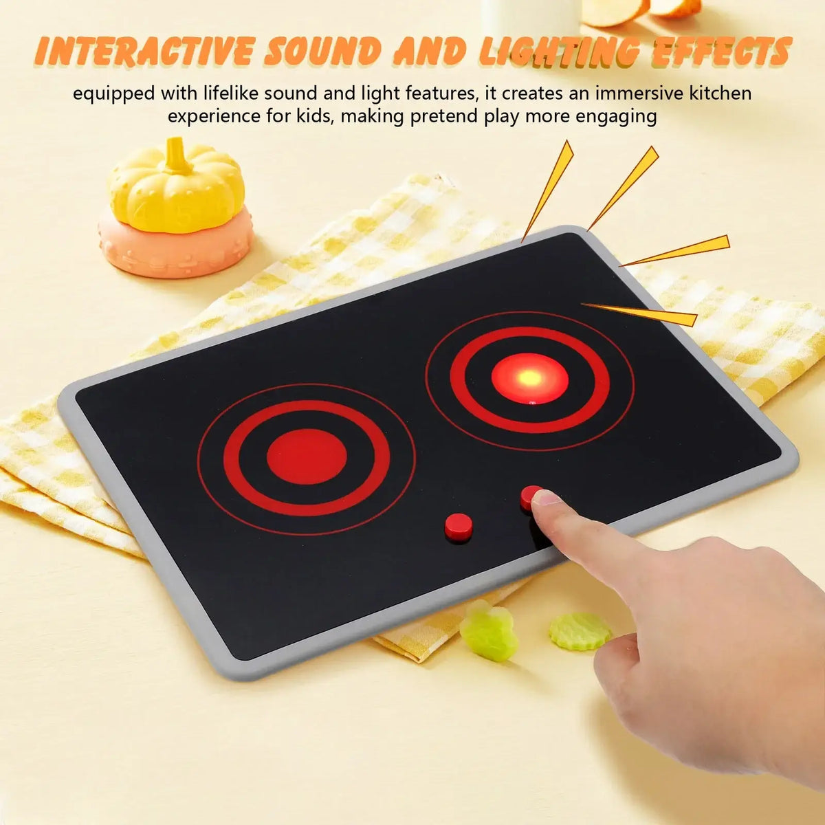 Toy induction stove with sound and light featuring a black and gray interactive stovetop with red circular burners