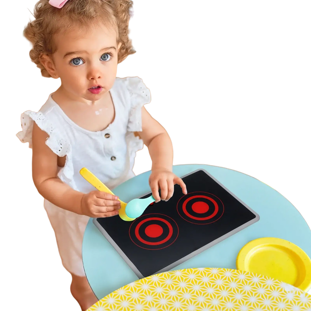 Toy induction stove with sound and light featuring a black stovetop with red circular burners and gray edges
