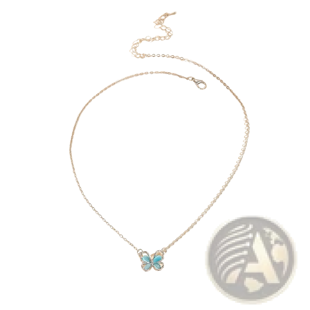 A delicate silver chain necklace with a light blue translucent butterfly gemstone pendant with intricate detailing