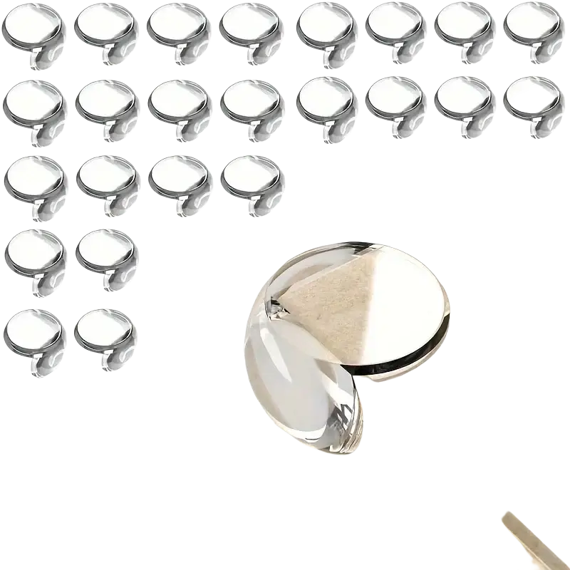 Shiny chrome-finished rounded furniture corner protector with sleek minimalist design for transparent corner protection