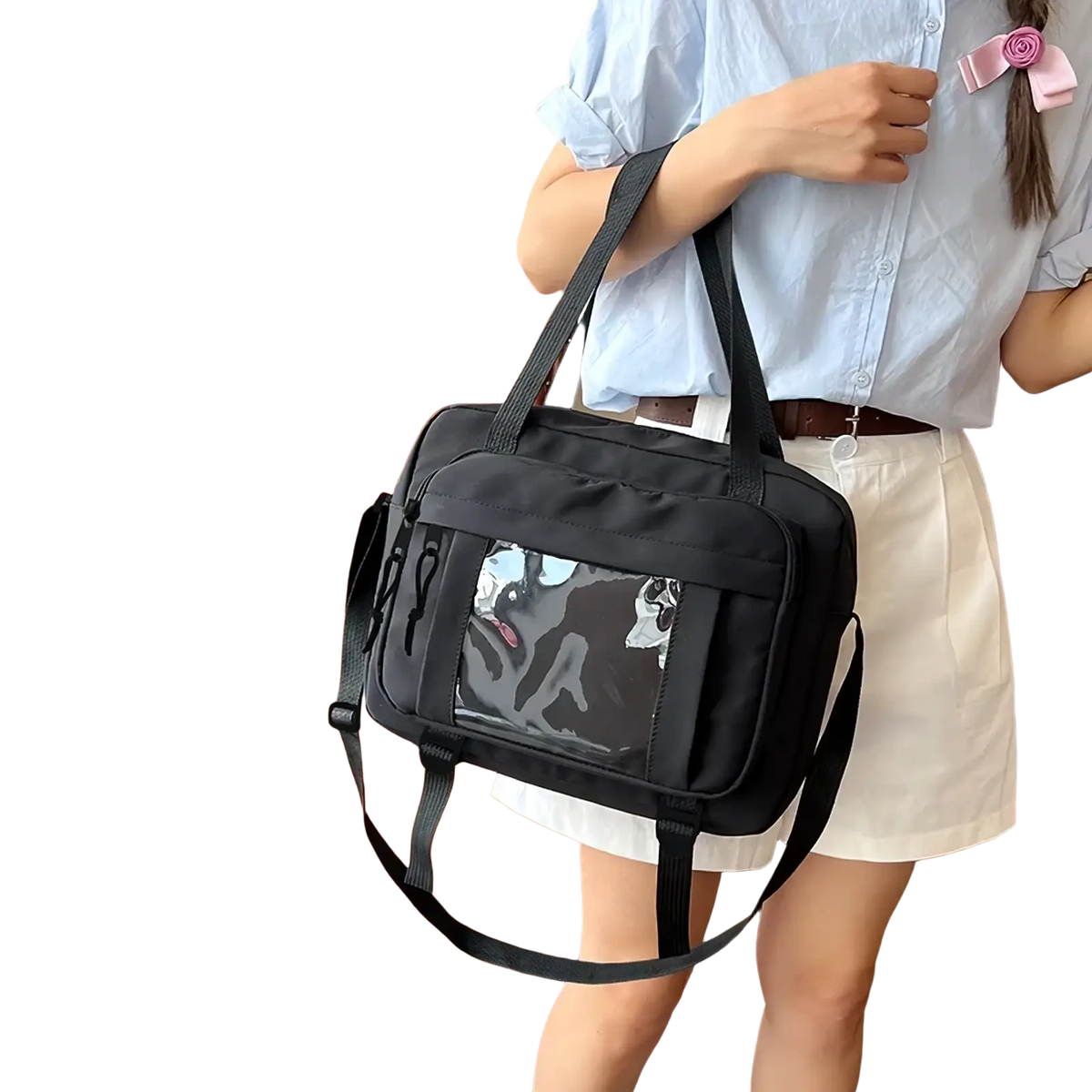 Black canvas travel messenger bag with transparent panel featuring an anime-style dog illustration