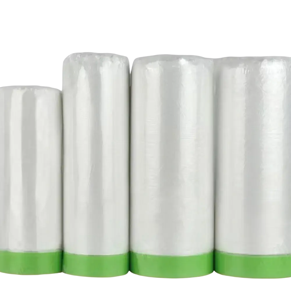 Four rolls of white painter’s tape with bright green adhesive strips for transparent plastic furniture dust cover film