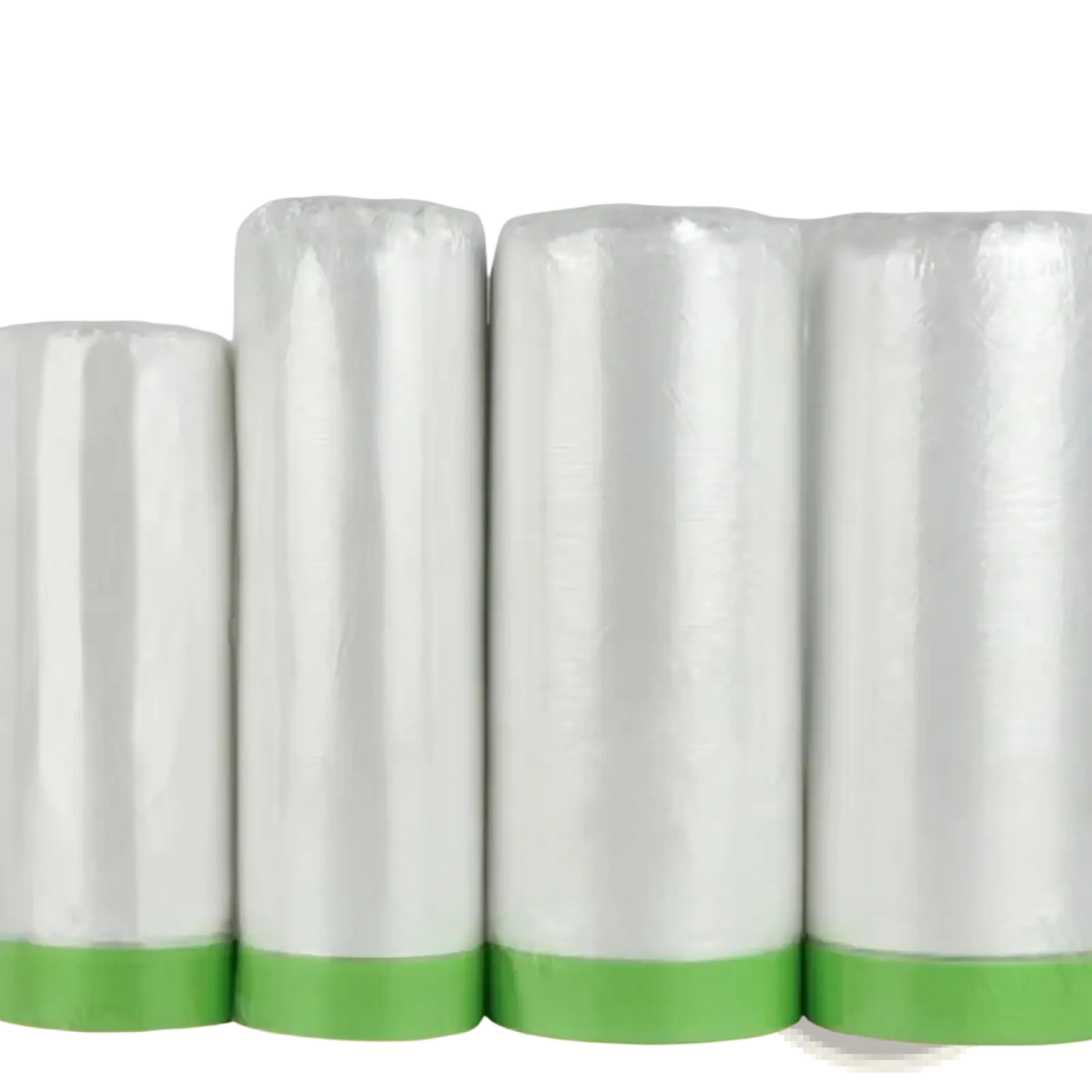 Four rolls of white painter’s tape with green adhesive strips used for transparent plastic furniture dust cover protection film