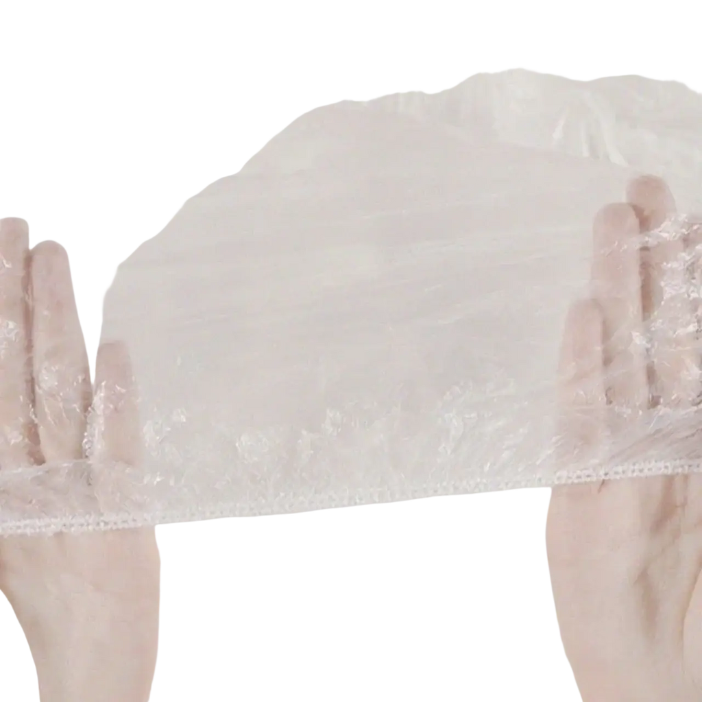 Transparent plastic furniture dust cover showing a reinforced three-layer stitched seam for durability