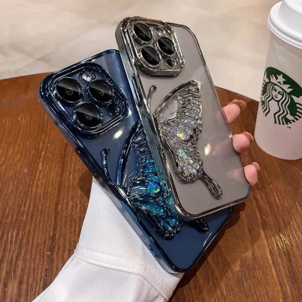 Transparent shatterproof quicksand phone case with silver butterfly embellishment and iridescent blue glitter on back