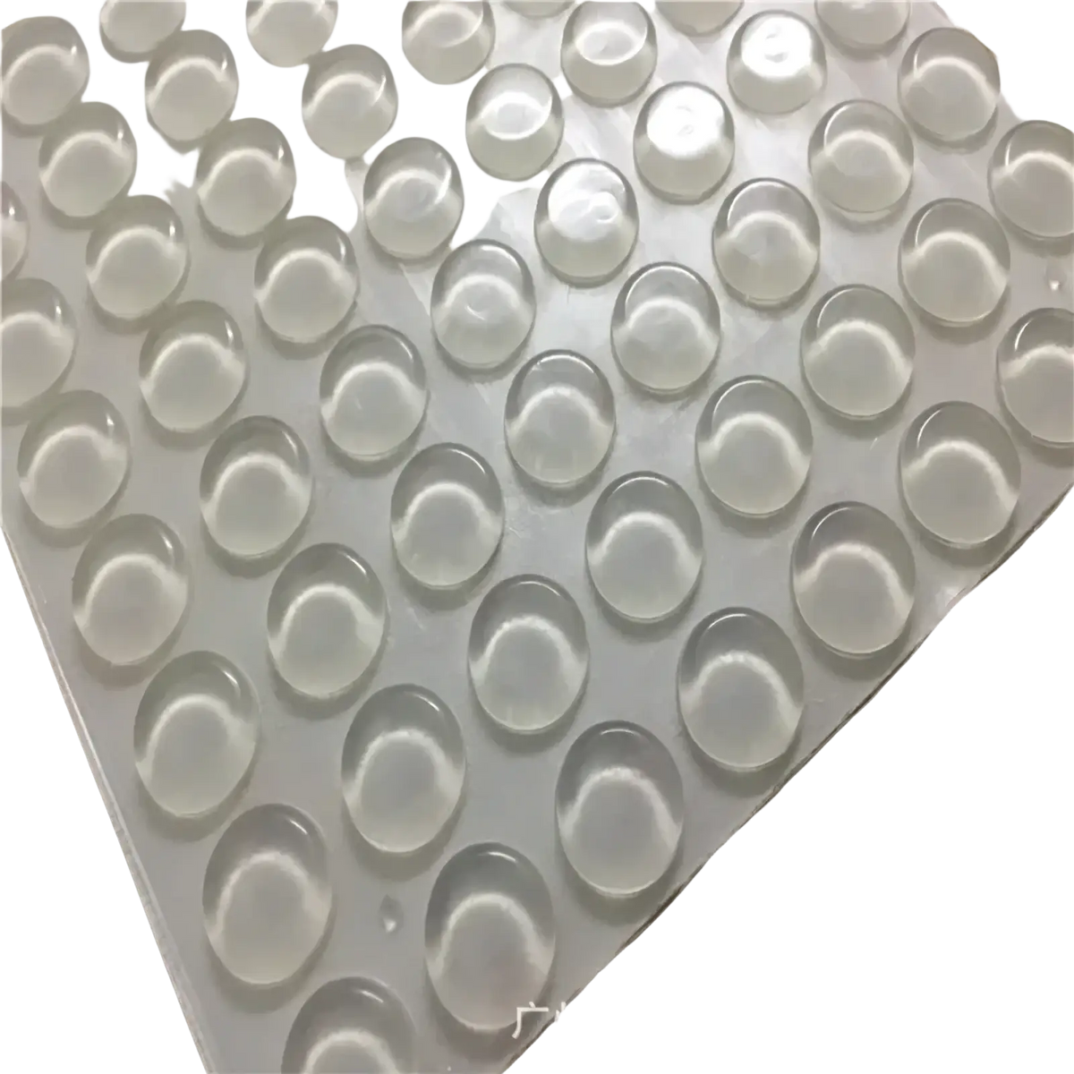 Transparent silicone furniture bumpers and pads showing clear translucent silicone feet pads arranged in a grid on white backing