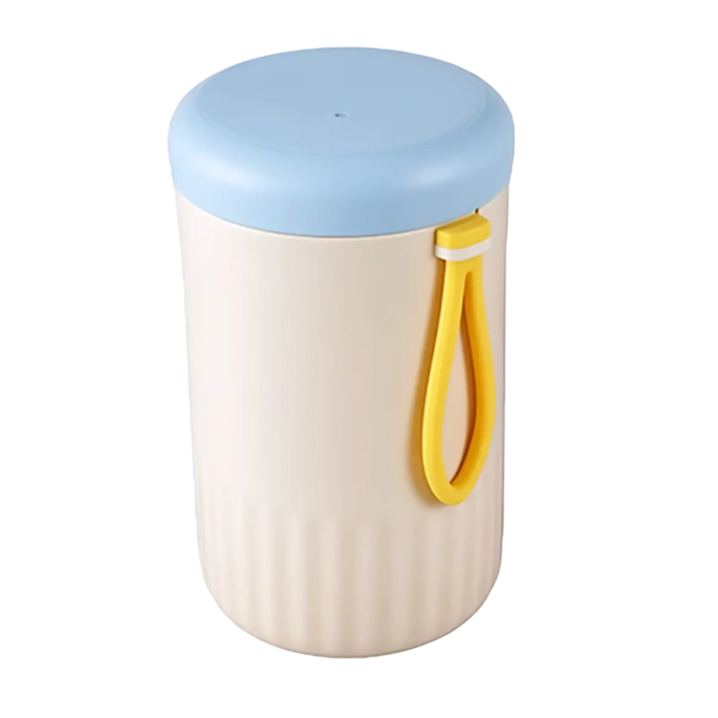 Cream-colored insulated travel baby bottle cleaner cup with light blue lid and yellow silicone handle for easy grip