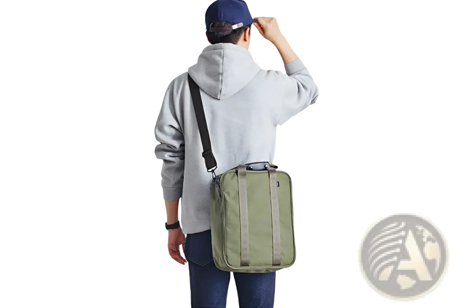 Olive green cotton canvas travel bag with black strap and reinforced side panels for organized storage