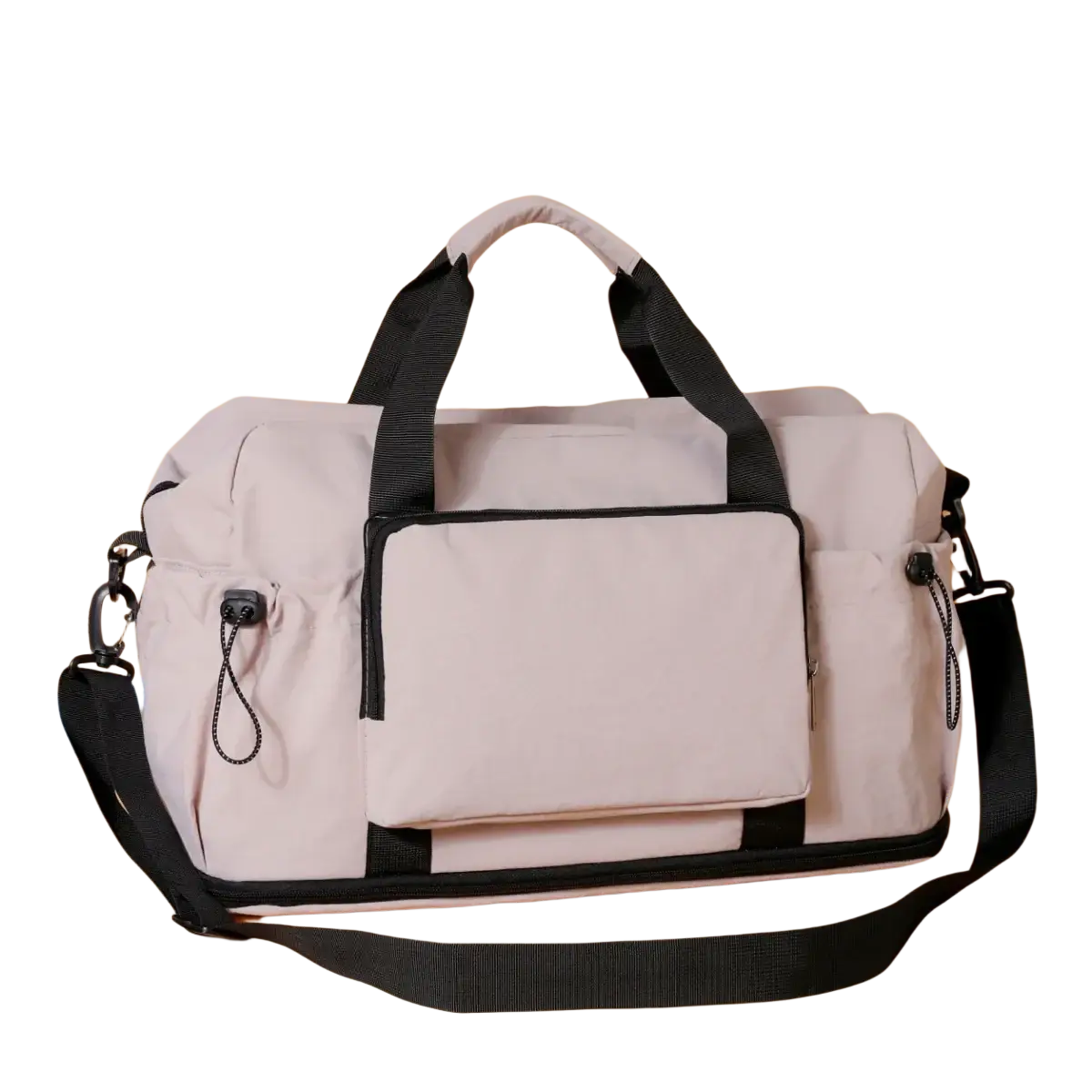 Beige sport duffel bag with black fabric handles and shoulder strap featuring multiple zippered compartments for travel