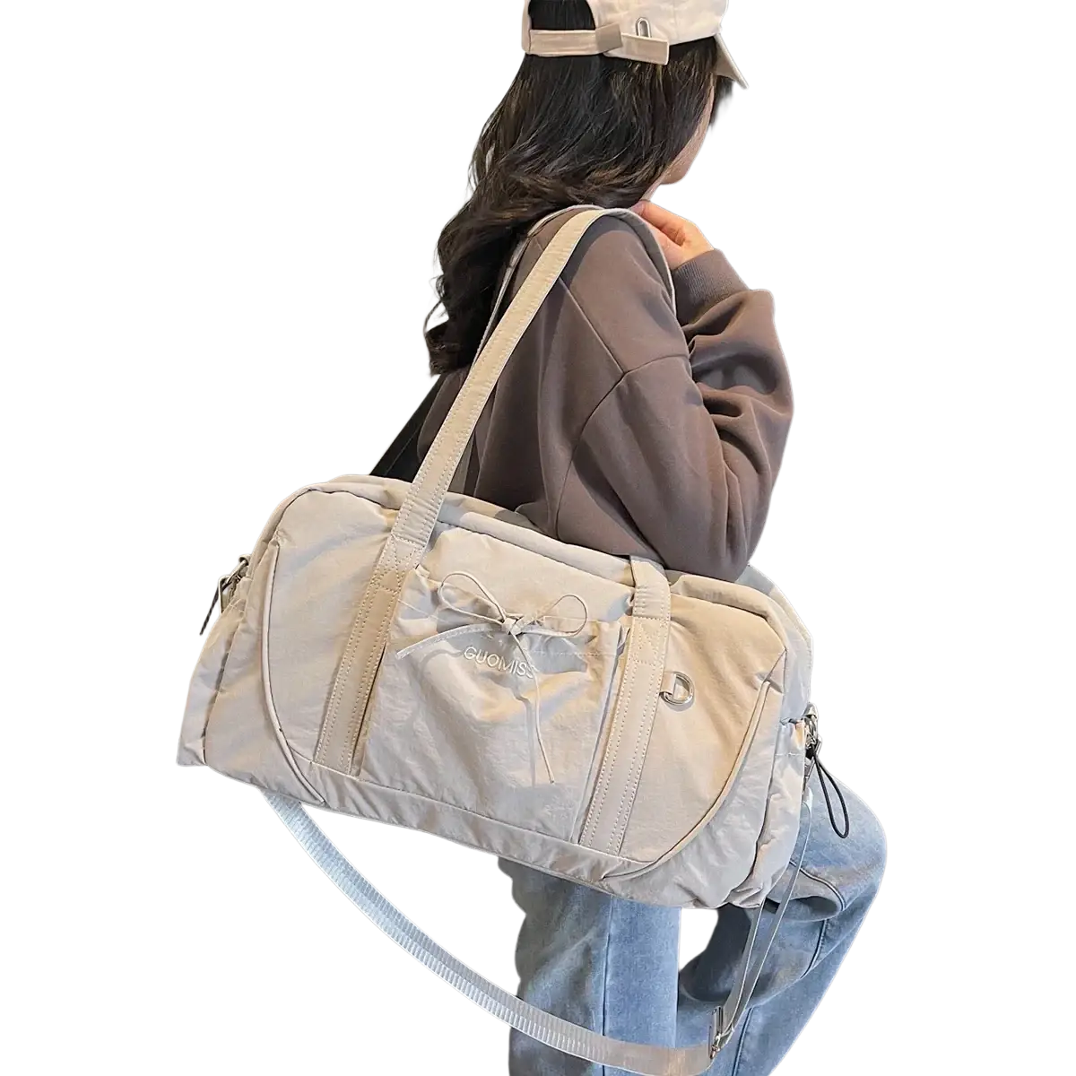 Beige nylon travel duffel bag with large capacity front bow and adjustable shoulder strap for women handbag use
