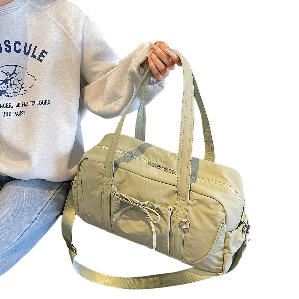 Beige large capacity travel duffel bag made of nylon with adjustable shoulder strap and front drawstring pocket