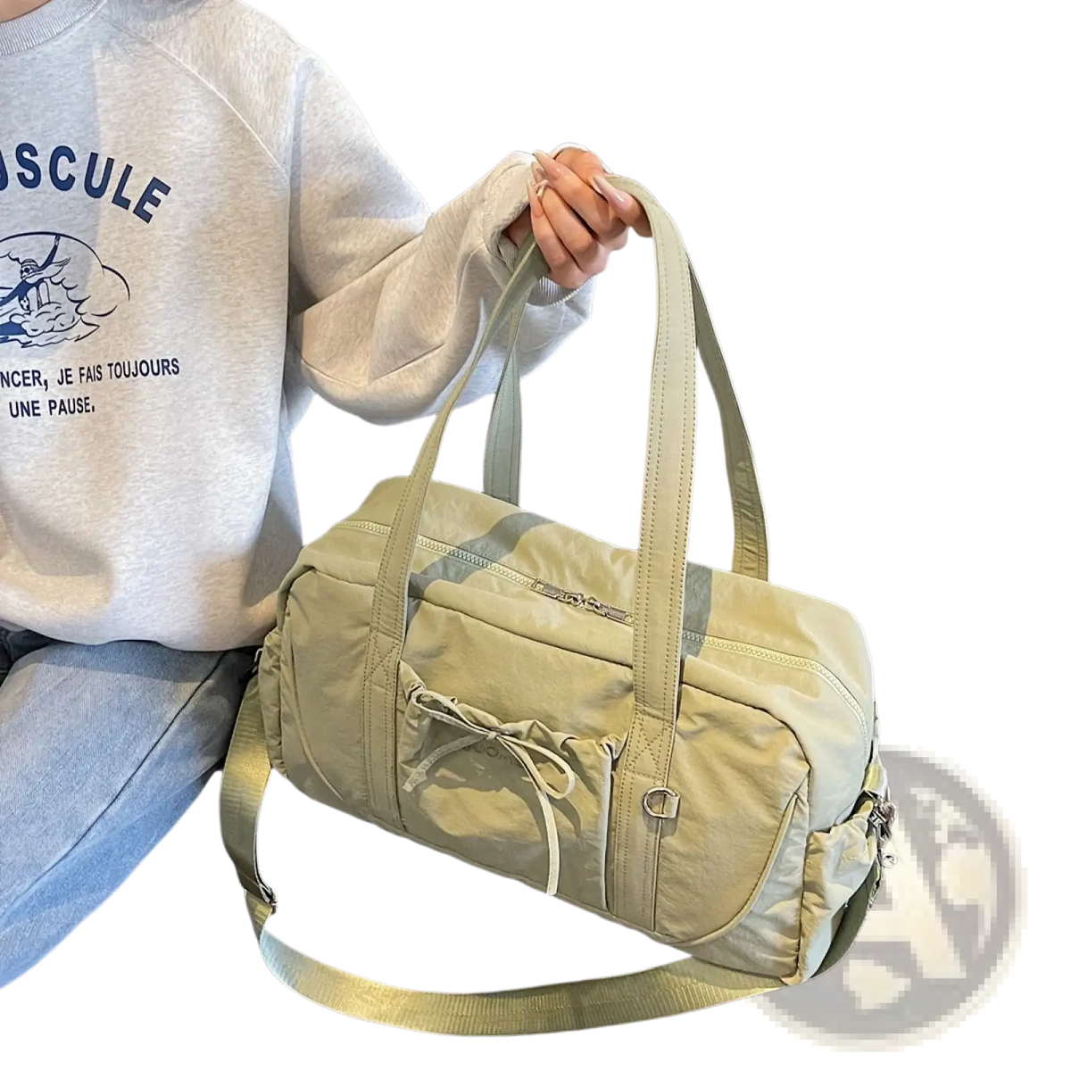 Beige large capacity travel duffel bag made of nylon with adjustable shoulder strap and front drawstring pocket