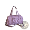 A lavender durable nylon travel duffel bag with large capacity front pocket bow detail and adjustable shoulder strap