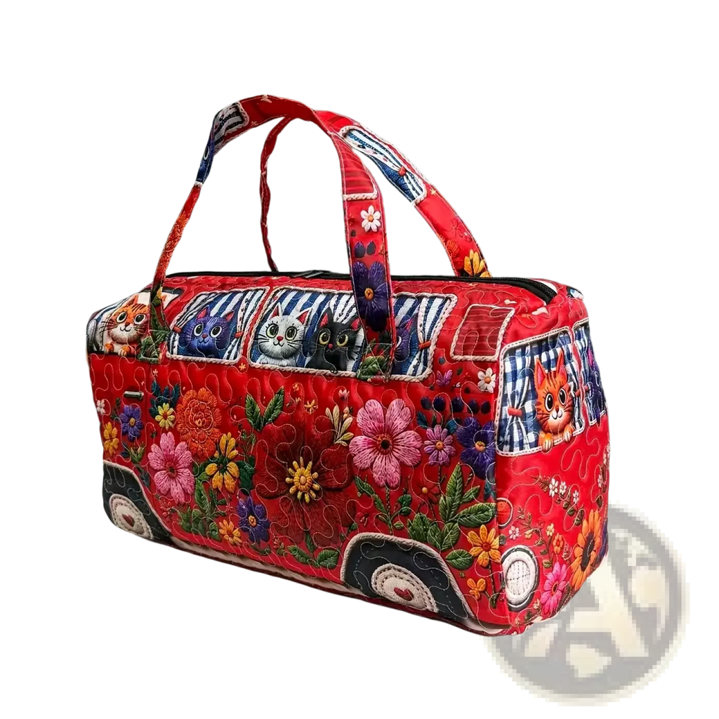 Vibrant red quilted travel duffel bag featuring a whimsical vintage van design with embroidered cats and floral patterns