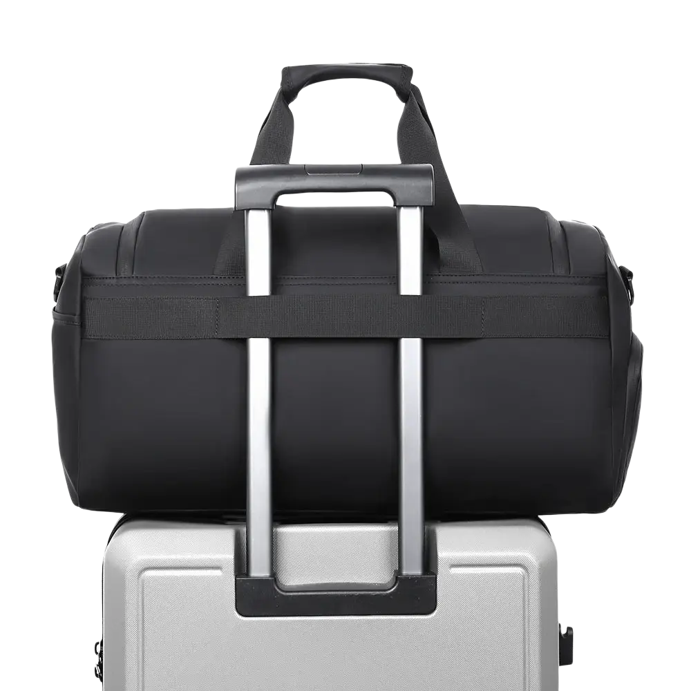 Black travel duffel bag with retractable handle sturdy fabric and shoe compartment for organized packing