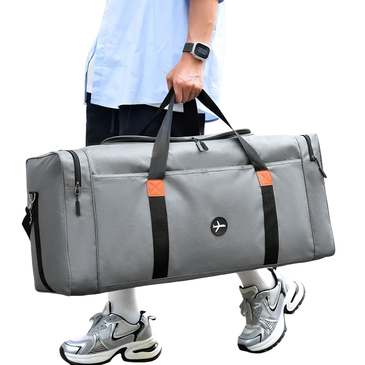 Travel duffel bag sports luggage crossbody in gray with black straps orange accent patches and small circular logo on front