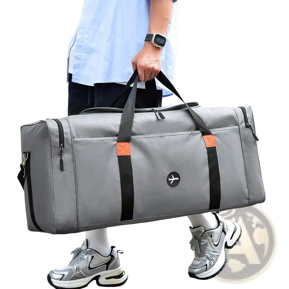 Travel duffel bag sports luggage crossbody in gray with black straps orange accent patches and small circular logo on front