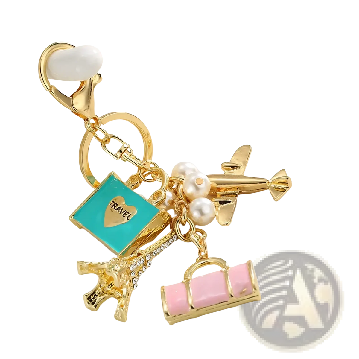 Gold-toned travel keychain with turquoise enamel heart tag, dangling pearls, airplane, Eiffel Tower, and pink suitcase charms
